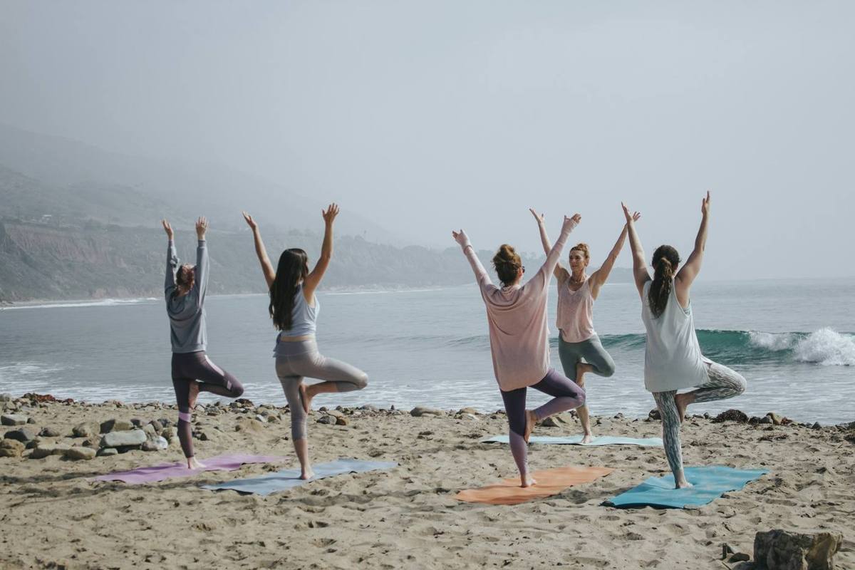 Beachside yoga at sunrise